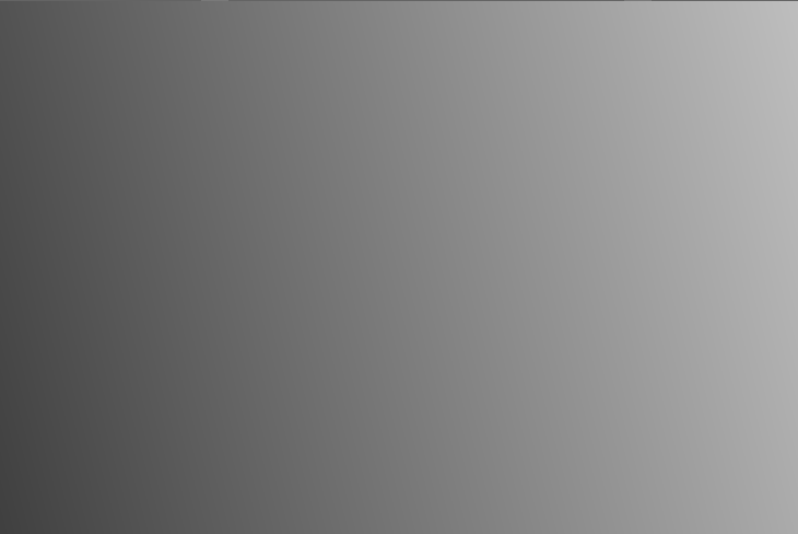 A grey and white background Description automatically generated